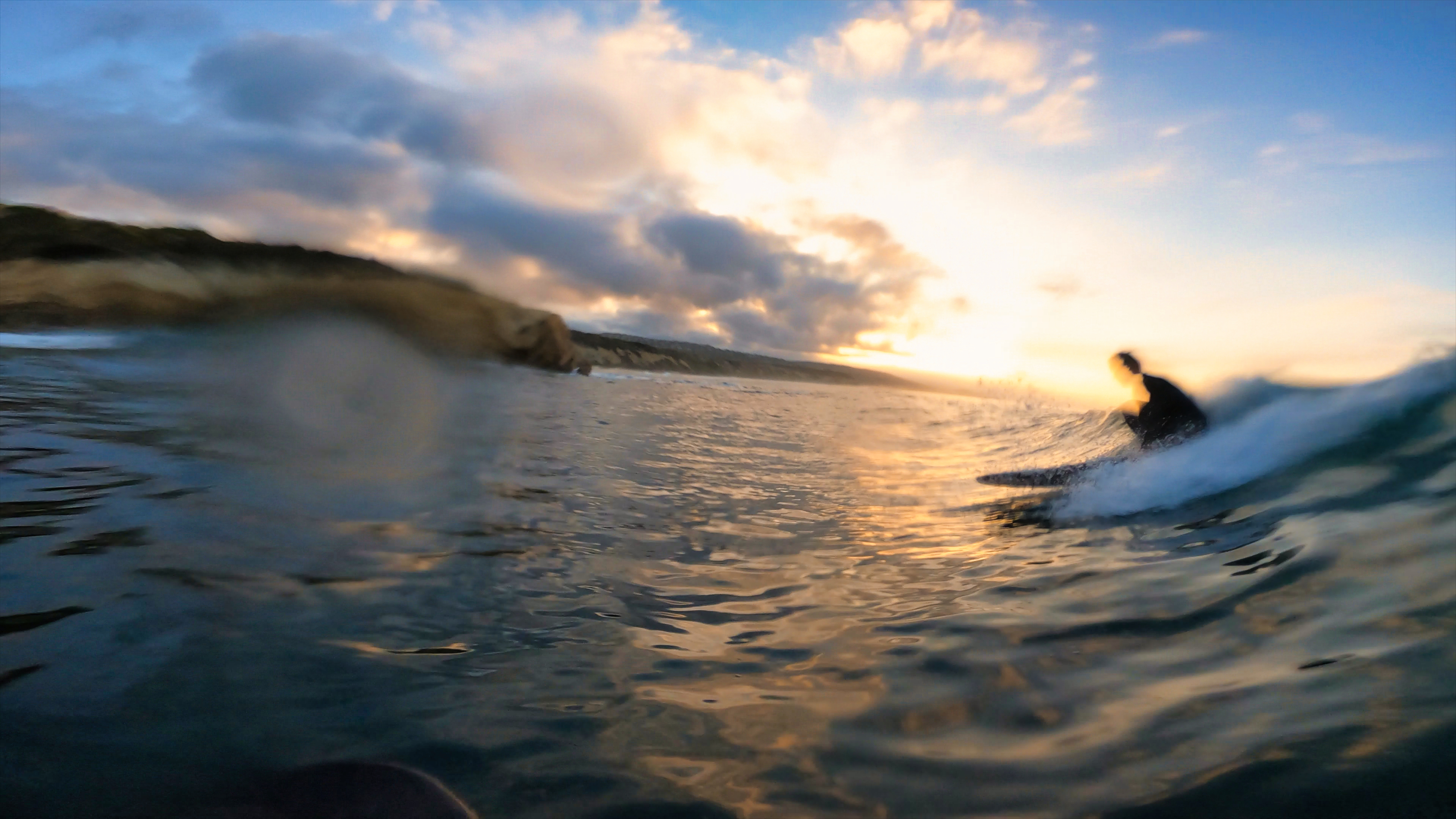 Side profile of VESL Soft Top Longboard showing rocker shape