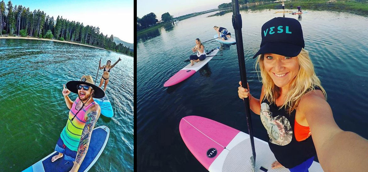 VESL Paddle Board on a calm lake at sunrise