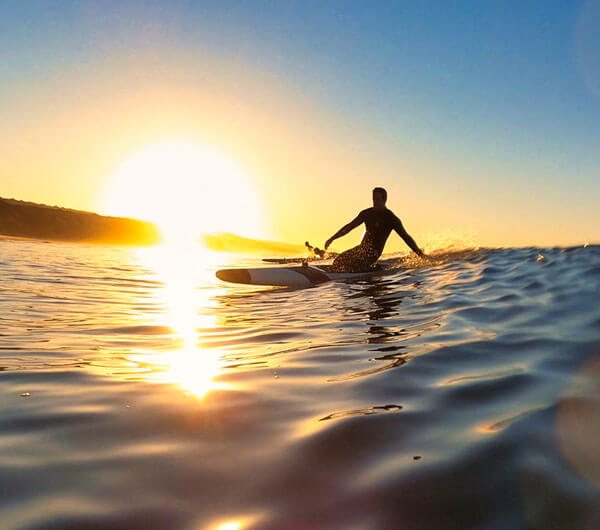 prone paddleboard surfing